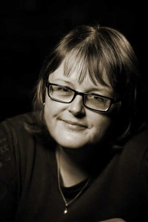 Sepia portrait photograph of author of contemporary fantasy fiction, Emily Tellwright