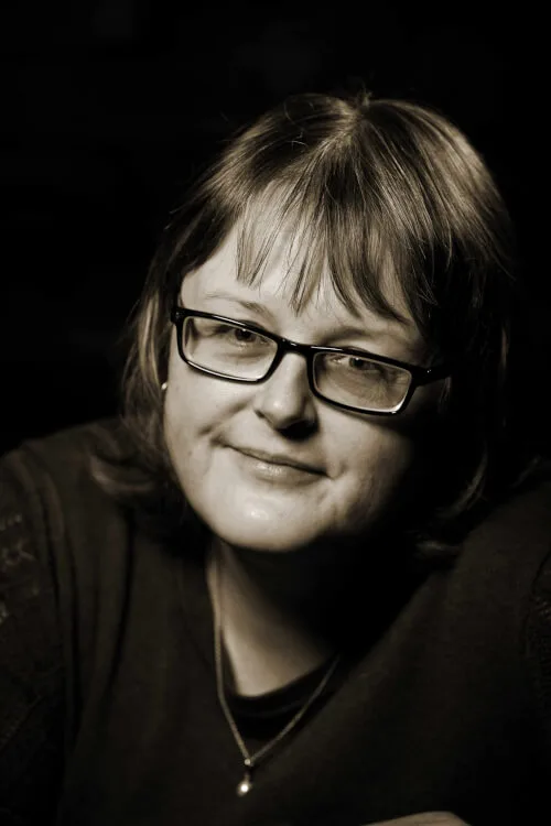 Sepia portrait photograph of author of contemporary fantasy fiction, Emily Tellwright