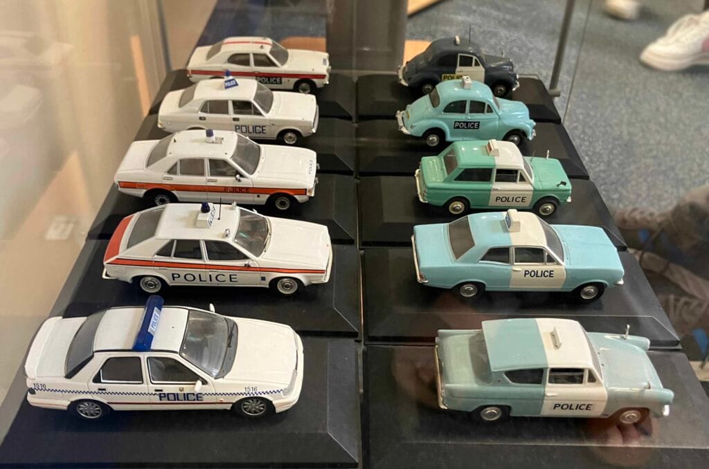 A selection of model police cars from the UK